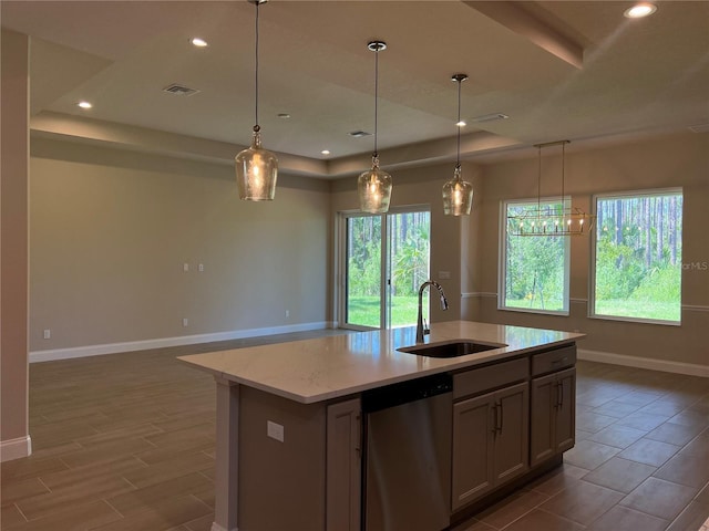 201 Hawthorn Ave, Palm Coast, FL 32164 - kitchen featuring dishwasher, a sink, baseboards, a raised ceiling, and recessed lighting