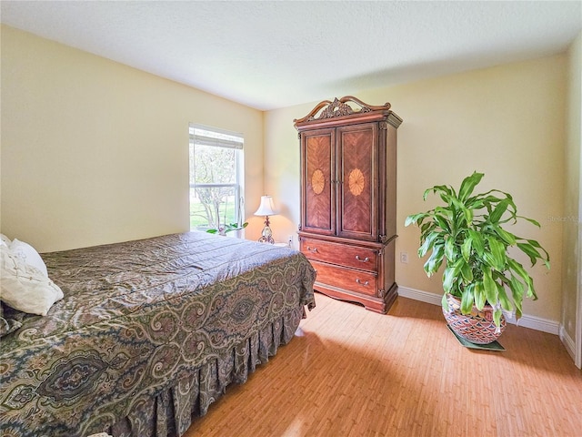 bedroom featuring light wood-type flooring