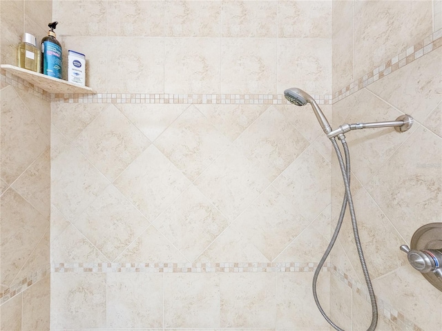 details featuring a tile shower