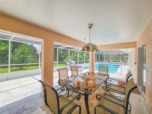 sunroom / solarium featuring a pool