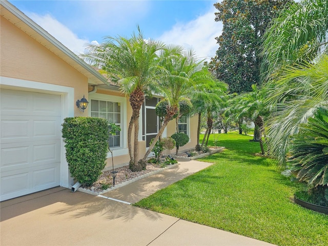 view of yard featuring a garage