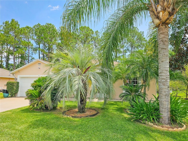 view of yard with a garage