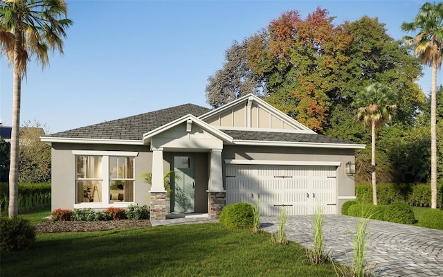 view of front of house featuring a garage and a front lawn