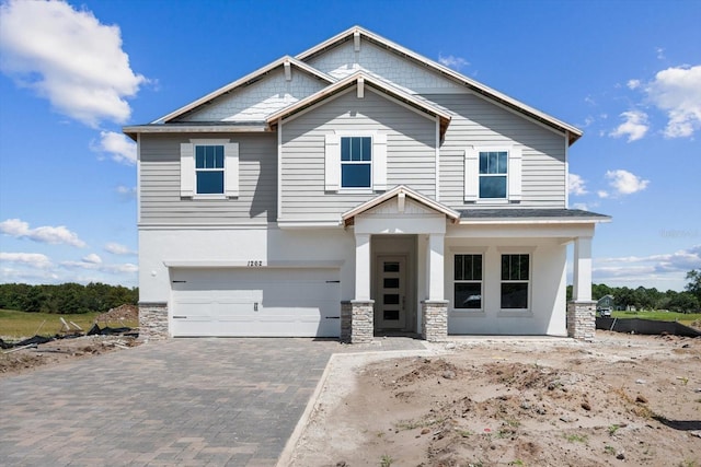 craftsman house featuring a garage