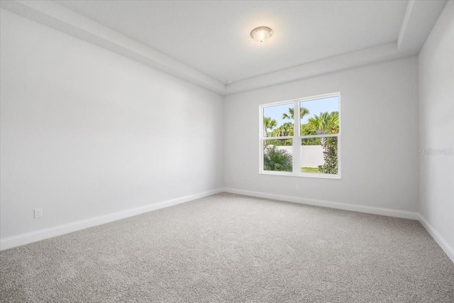 empty room featuring carpet floors