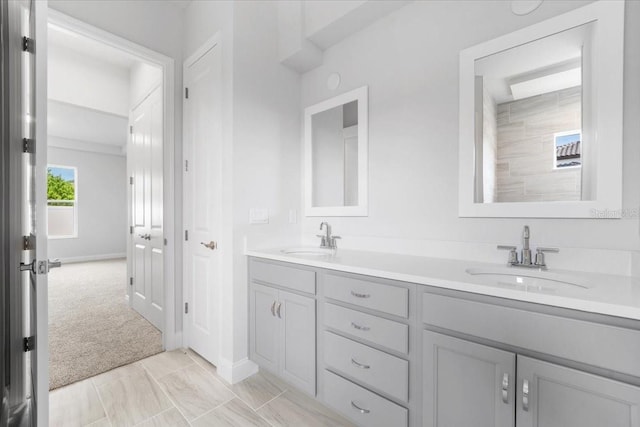 bathroom featuring double sink vanity and tile patterned floors