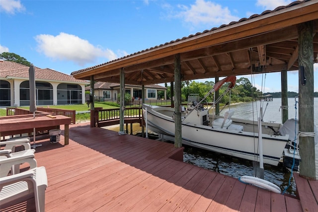 view of dock featuring a water view and boat lift