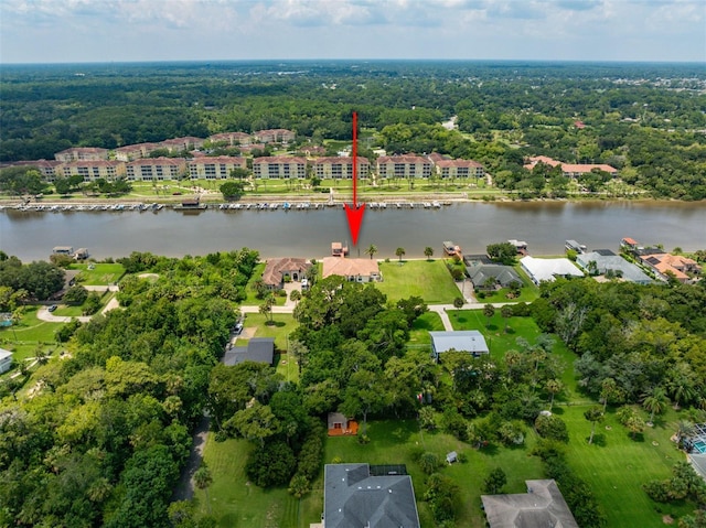 bird's eye view featuring a water view and a residential view