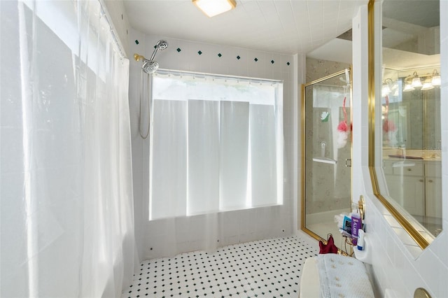 bathroom featuring a shower stall