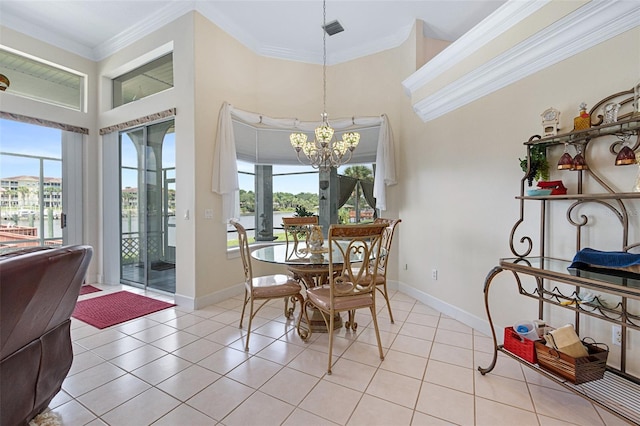 dining area featuring crown molding, light tile patterned floors, baseboards, and a notable chandelier