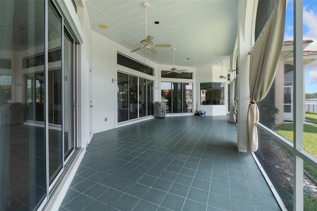 unfurnished sunroom featuring a healthy amount of sunlight