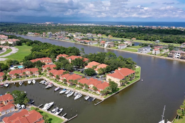 birds eye view of property featuring a water view