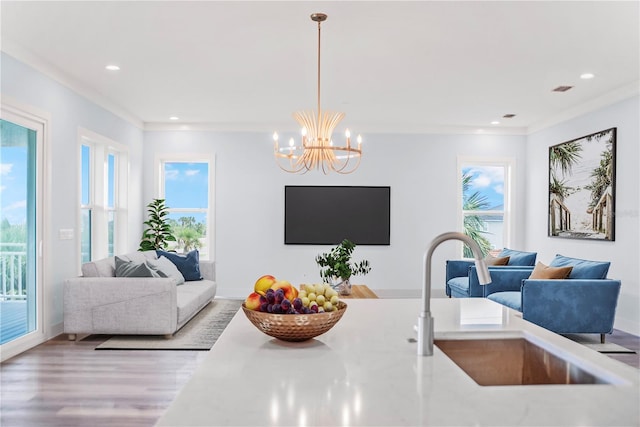 interior space featuring recessed lighting, visible vents, baseboards, and wood finished floors