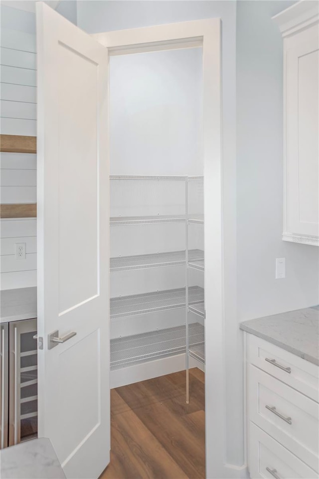 pantry featuring wine cooler