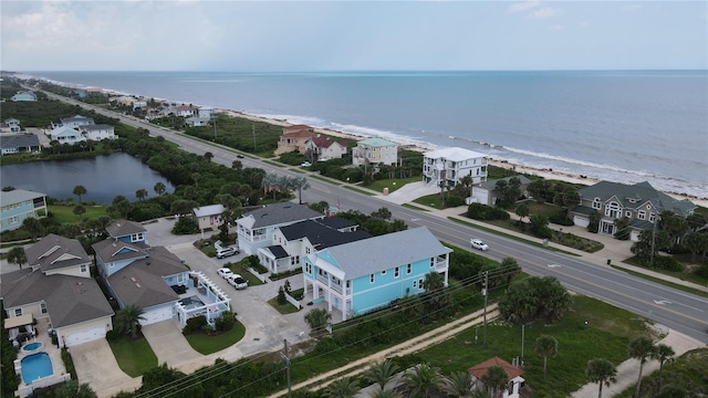 aerial view featuring a water view and a residential view