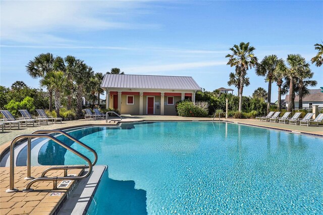 view of pool featuring a patio area