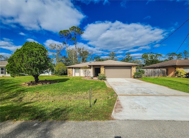 ranch-style home featuring a front lawn and a garage