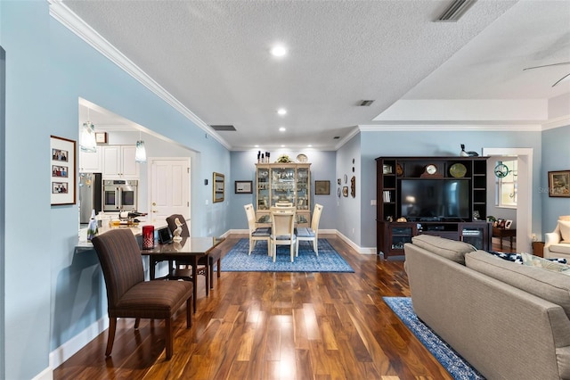 interior space with dark hardwood / wood-style floors, a textured ceiling, and crown molding