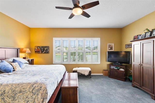 bedroom with ceiling fan and carpet flooring