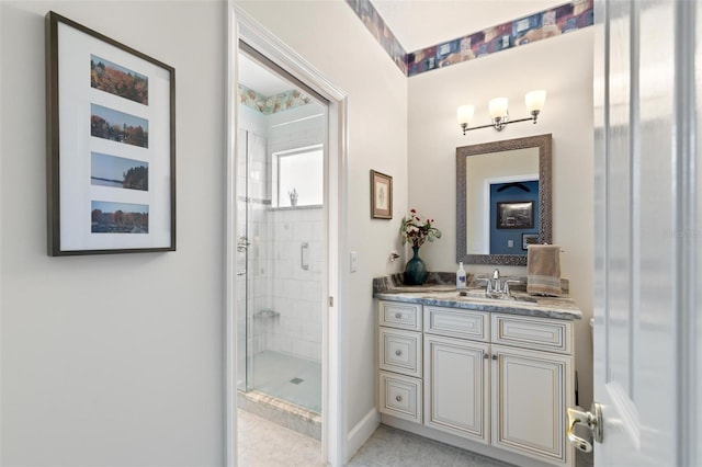 bathroom with vanity and walk in shower