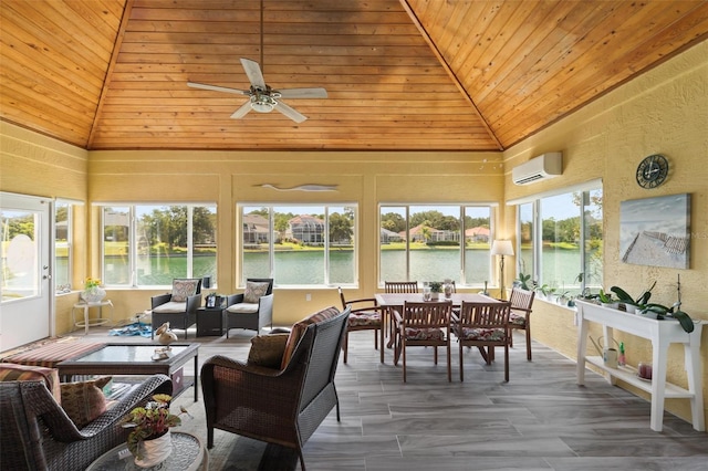 sunroom with wood ceiling, a water view, a wall mounted air conditioner, and vaulted ceiling