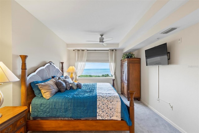 bedroom with ceiling fan and carpet floors