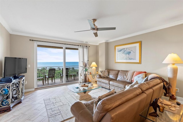 living room featuring ceiling fan, crown molding, and a water view