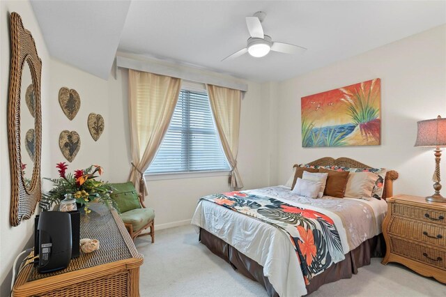 bedroom featuring baseboards, carpet, and a ceiling fan