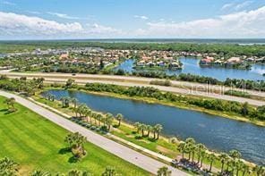 bird's eye view with a water view