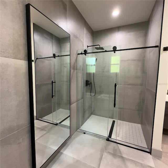 bathroom featuring tile patterned floors and walk in shower