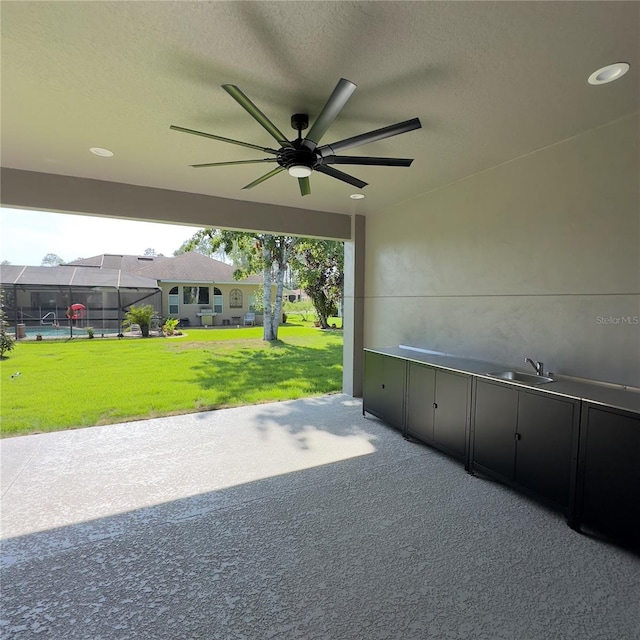 exterior space featuring ceiling fan