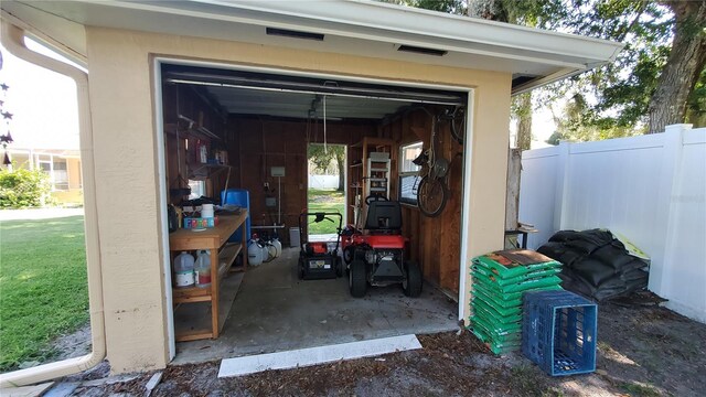 garage with a lawn