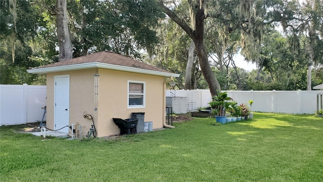 view of outdoor structure featuring a yard