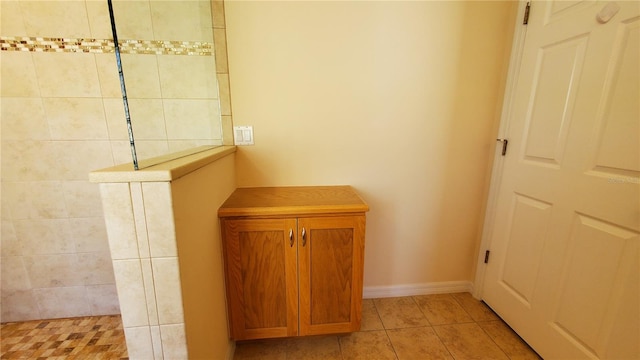 hallway with light tile patterned flooring