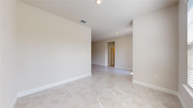 empty room featuring a wealth of natural light