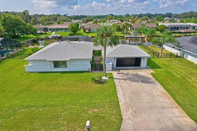 aerial view featuring a water view and a residential view