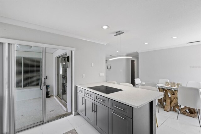 kitchen featuring a peninsula, black electric cooktop, gray cabinets, light countertops, and recessed lighting