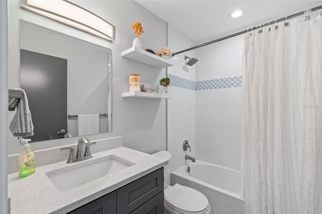 bathroom featuring shower / bathtub combination with curtain, toilet, and vanity