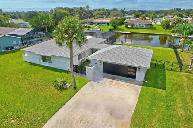 drone / aerial view with a water view