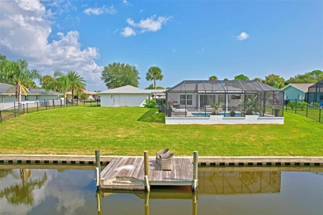 view of dock featuring glass enclosure, a water view, a pool, and a yard