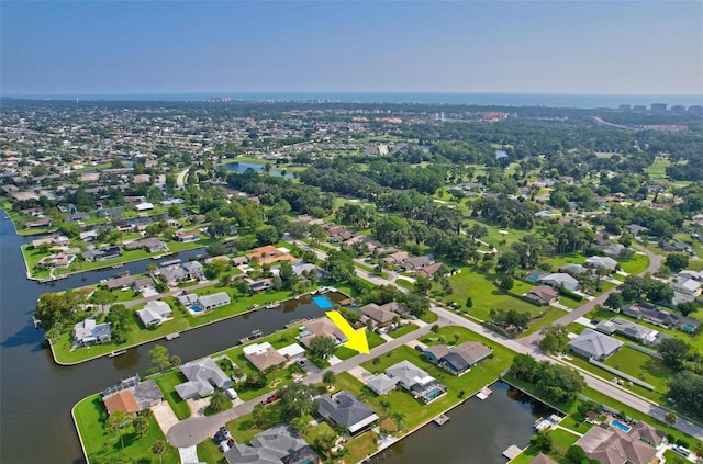 drone / aerial view featuring a water view