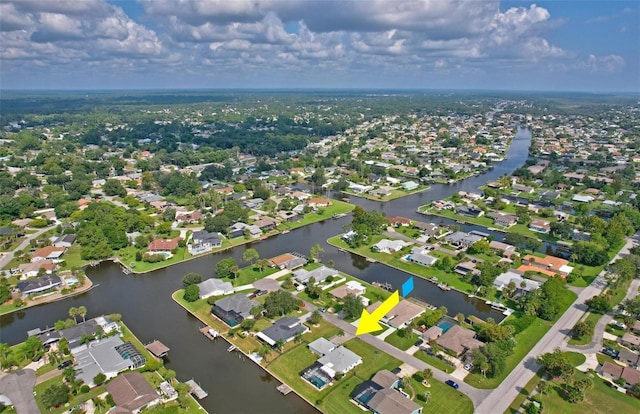aerial view with a water view and a residential view