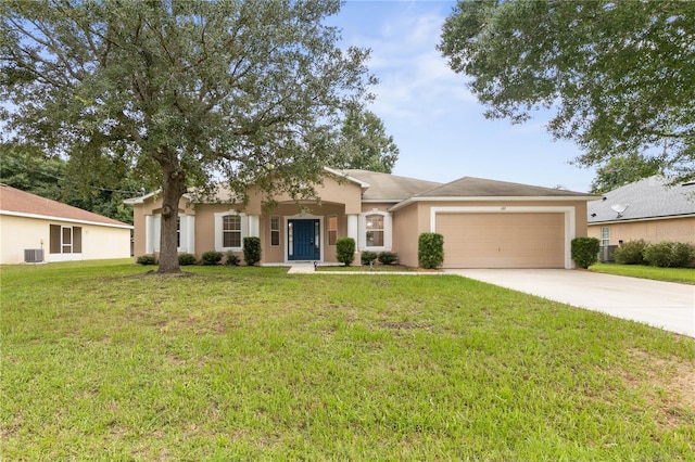 ranch-style home featuring stucco siding, concrete driveway, central AC, a garage, and a front lawn