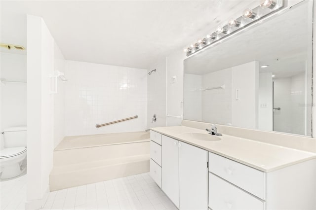 bathroom featuring toilet, vanity,  shower combination, and tile patterned floors