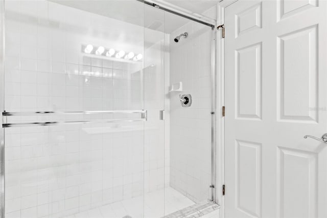 bathroom featuring a stall shower