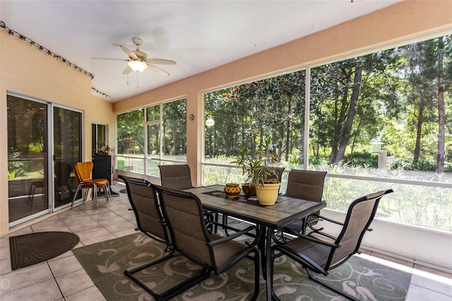 sunroom with a ceiling fan