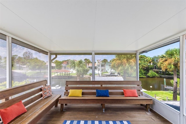 sunroom with a water view