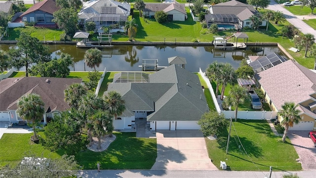 birds eye view of property featuring a water view