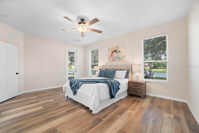 bedroom featuring ceiling fan and wood-type flooring