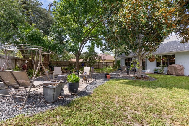 view of yard with a patio area